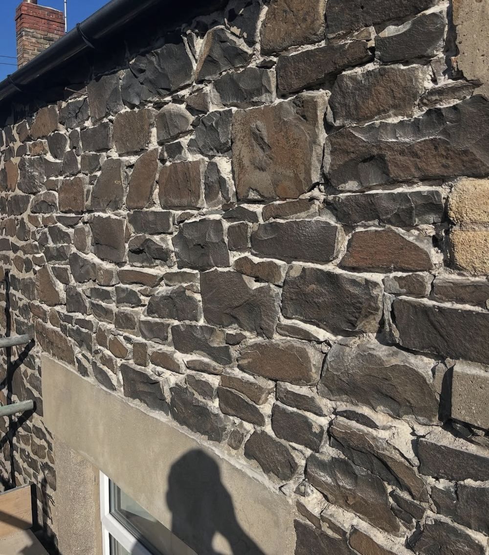 Old mortar raked out of stonework