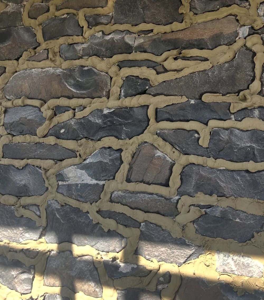 New mortar packed into the joints